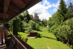 Westbalkonaussicht in den Garten