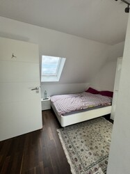 Zimmer im Spitzboden