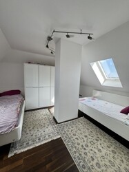 Schlafzimmer im Spitzboden