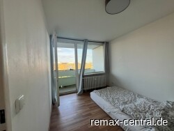 Schlafzimmer mit Balkon