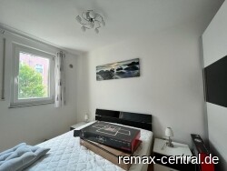 Schlafbereich hinter Wohnwand