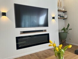 Fernsehwand mit Kamin