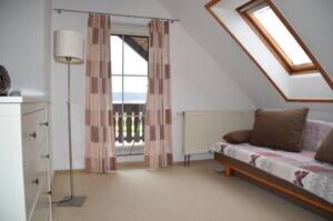 Gästezimmer mit Terrasse und Seeblick
