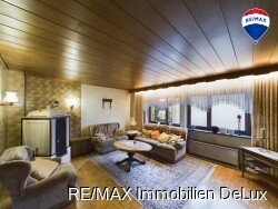 RE/MAX Immobilien DeLux Wohnzimmer EG