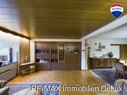 RE/MAX Immobilien DeLux Wohnzimmeransicht 2 EG