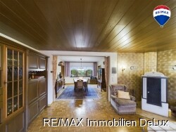 RE/MAX Immobilien DeLux Wohnzimmeransicht 3