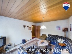 RE/MAX Immobilien DeLux Wohnzimmeransicht 2 OG