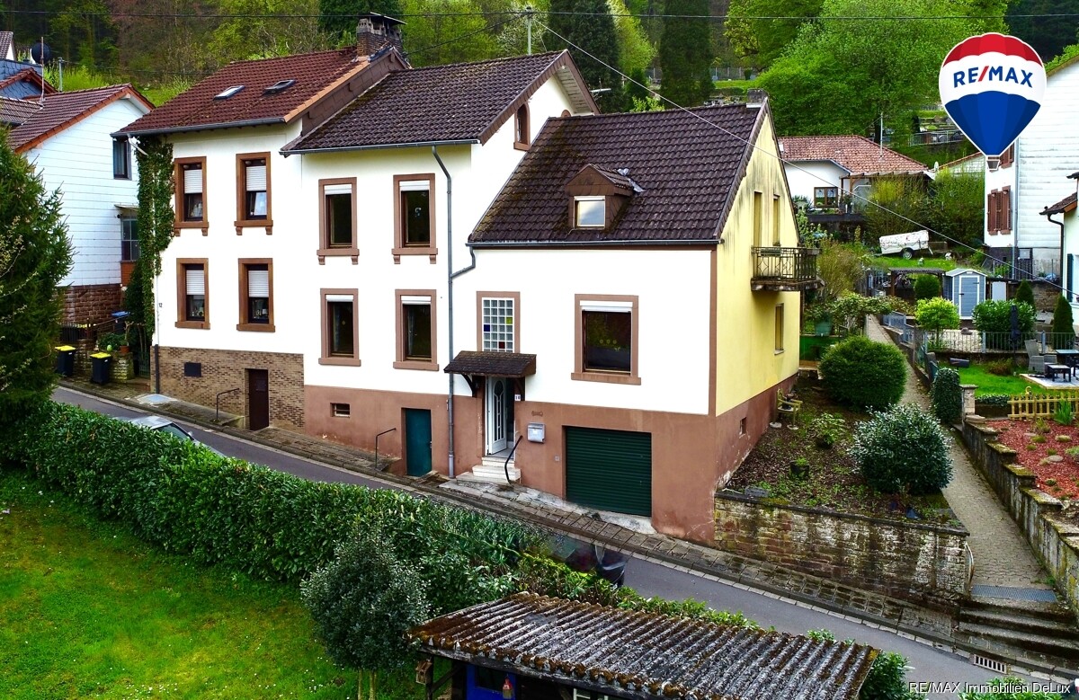 RE/MAX Immobilien DeLux Haus Mettlach Außenansicht