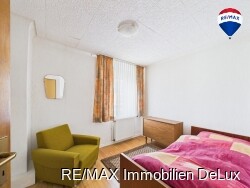 RE/MAX Immobilien DeLux Haus in Losheim am See/ Bachem 
