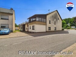 RE/MAX Immobilien DeLux Haus in Losheim am See/ Bachem 