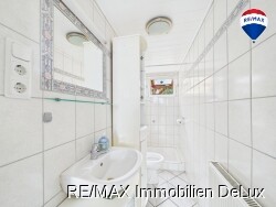 RE/MAX Immobilien DeLux Haus Mettlach Badezimmer EG