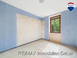 RE/MAX Immobilien DeLux Haus Mettlach Zimmer OG