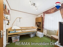 RE/MAX Immobilien DeLux Gaestezimmer