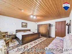 RE/MAX Immobilien DeLux Schlafzimmer UG 2