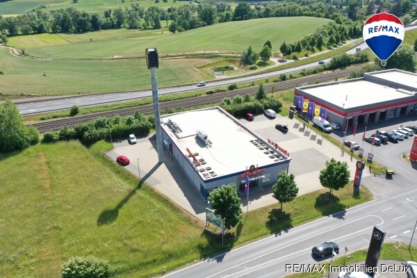 RE/OMAX Immobilien DeLux