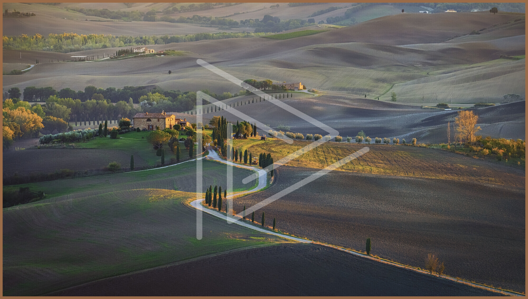 aerial-shot-field-hills-sunlight