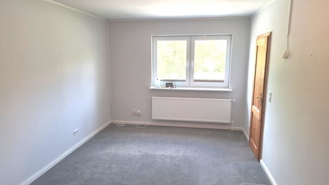 Schlafzimmer mit Zugang zum Bad
