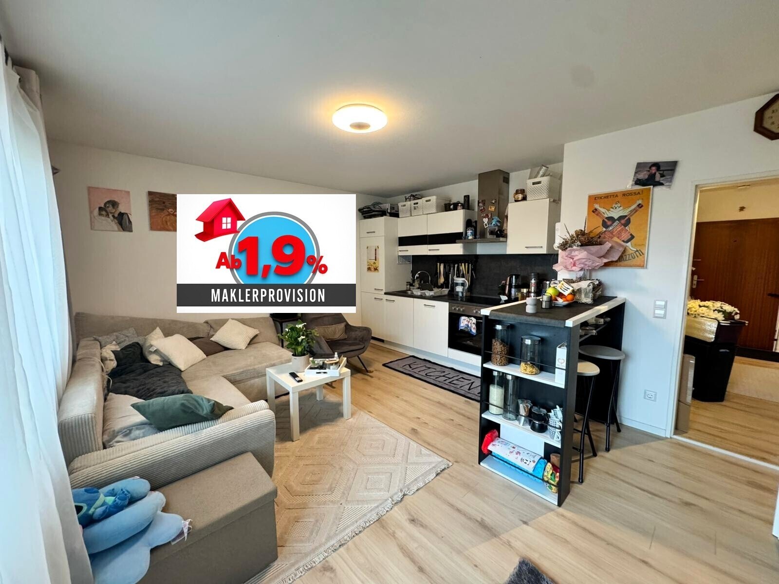 Wohnzimmer mit Küche - Logo