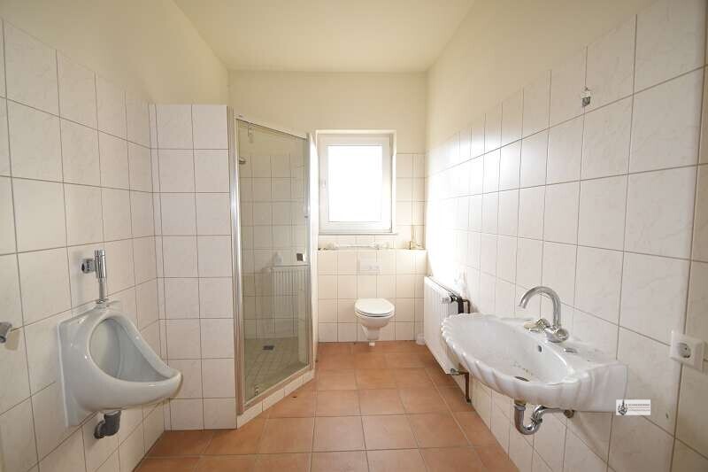 Toilette mit Dusche