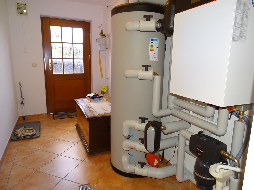 Heizungsanlage mit Zugang nach außen,KG