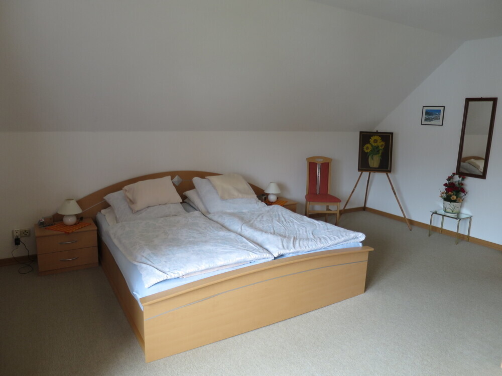 Schlafzimmer mit Balkon