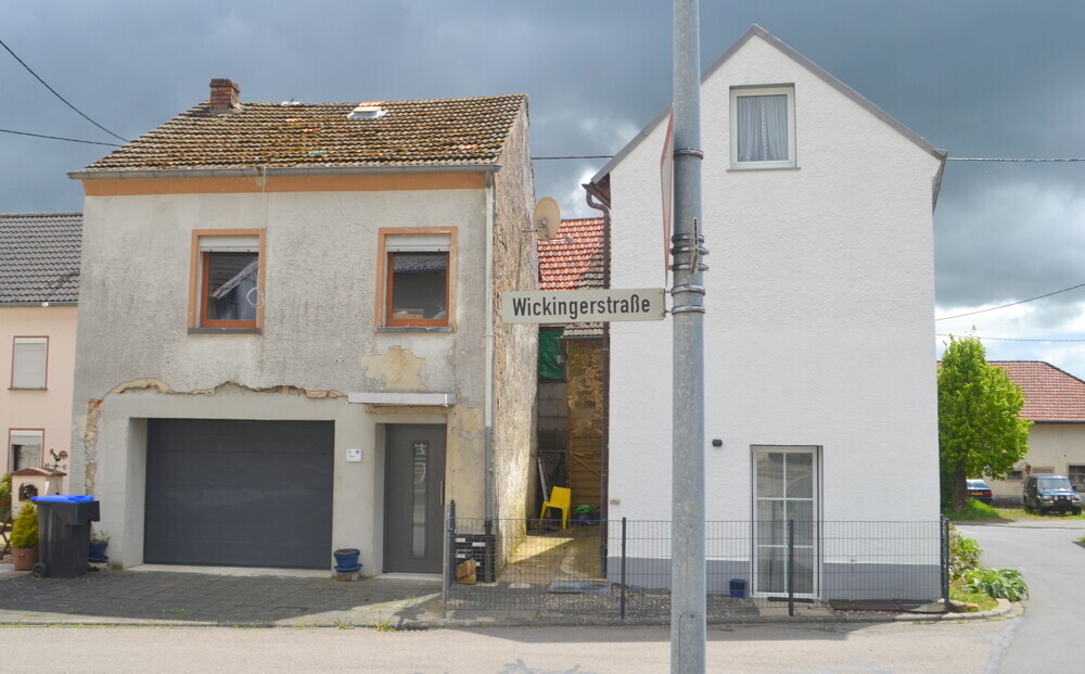 Haus mit Werkstatt und Garage