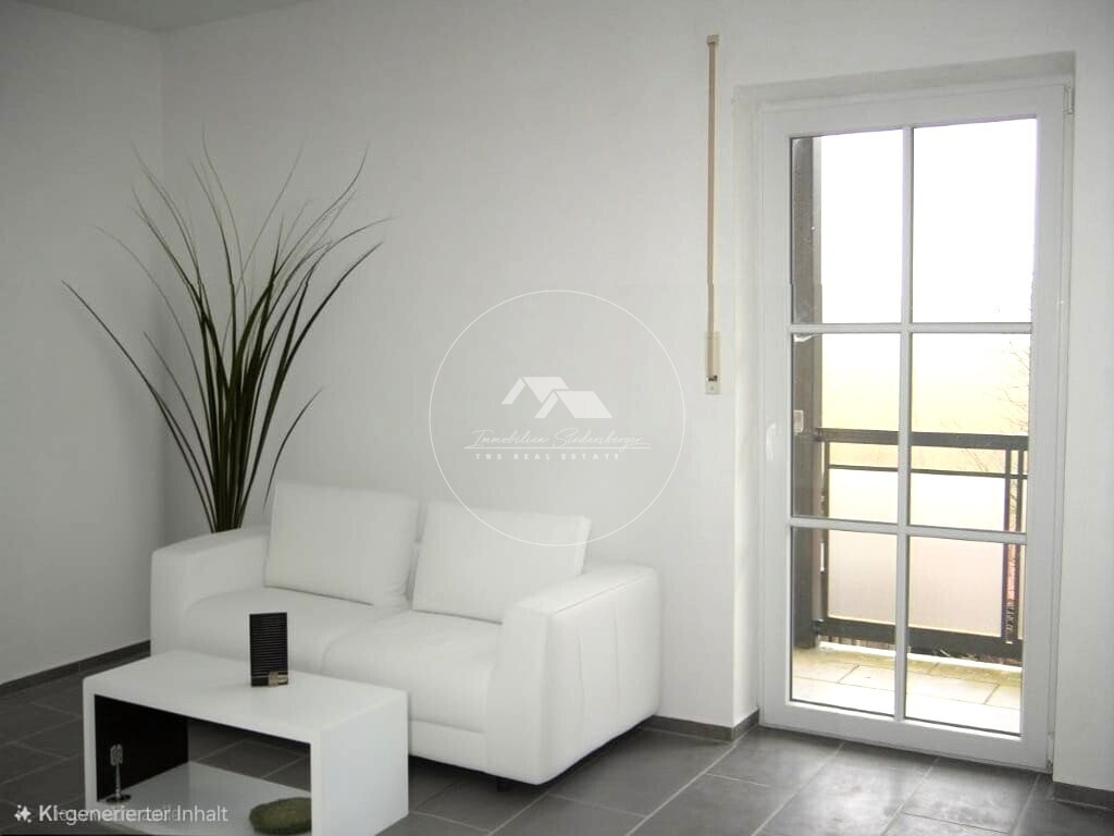 Wohnzimmer mit Zugang zum Balkon