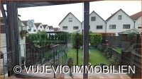 Wintergarten mit Gartenblick