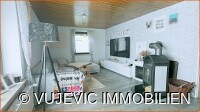 Wohnzimmer mit Kaminofen
