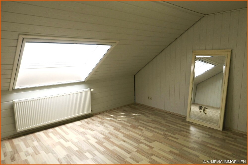Mansardenzimmer mit Heizung