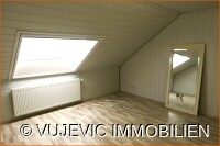 Mansardenzimmer mit Heizung