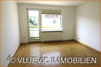 Schlafzimmer mit Balkonzugang