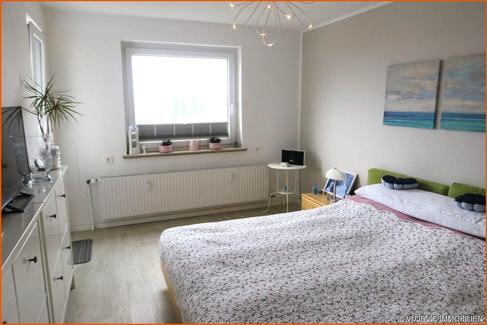 Schlafzimmer mit Balkonzugang