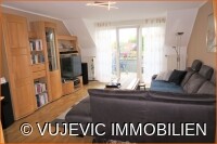 Wohnzimmer mit Balkonzugang