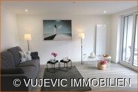 Offener Wohnbereich mit Terrassenzugang