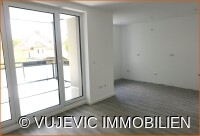 Wohnküche mit Balkonzugang