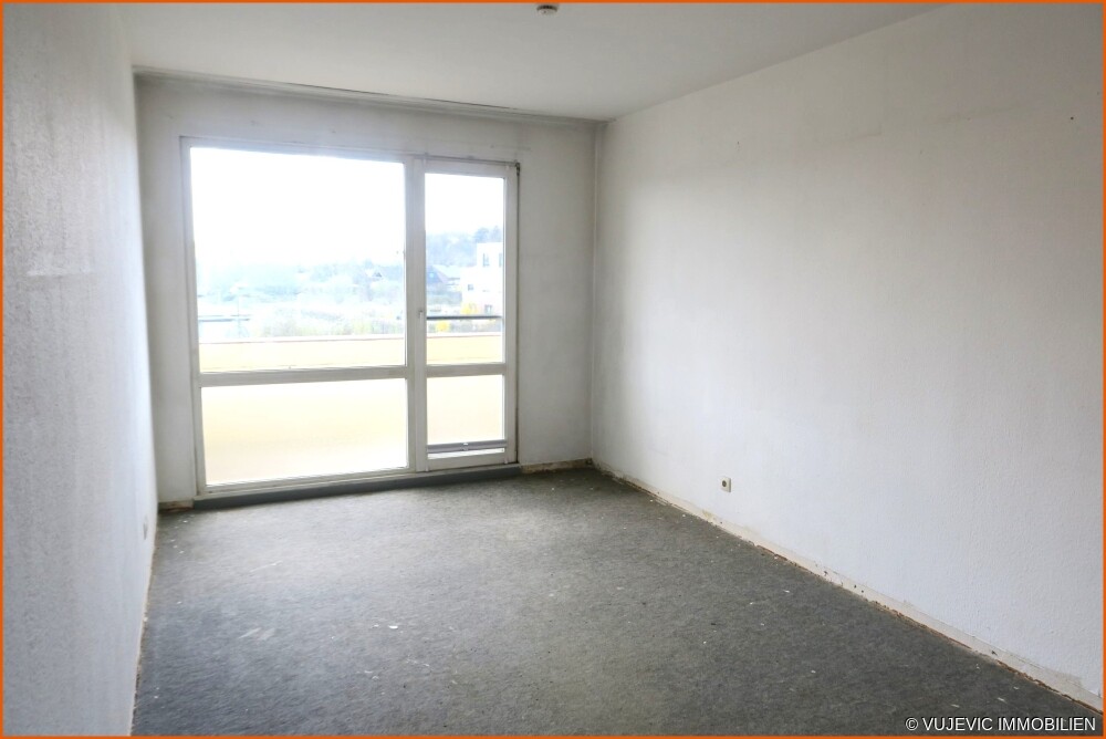 Schlafzimmer mit Balkonzugang