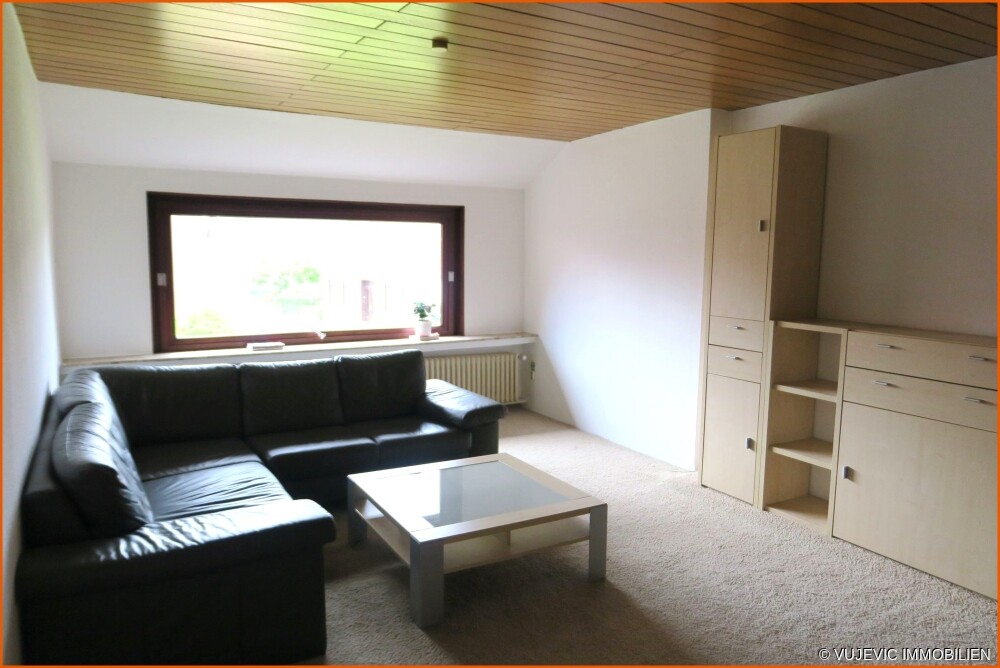 Wohnzimmer im DG (linke Whg.)
