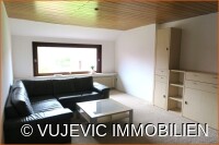 Wohnzimmer im DG (linke Whg.)