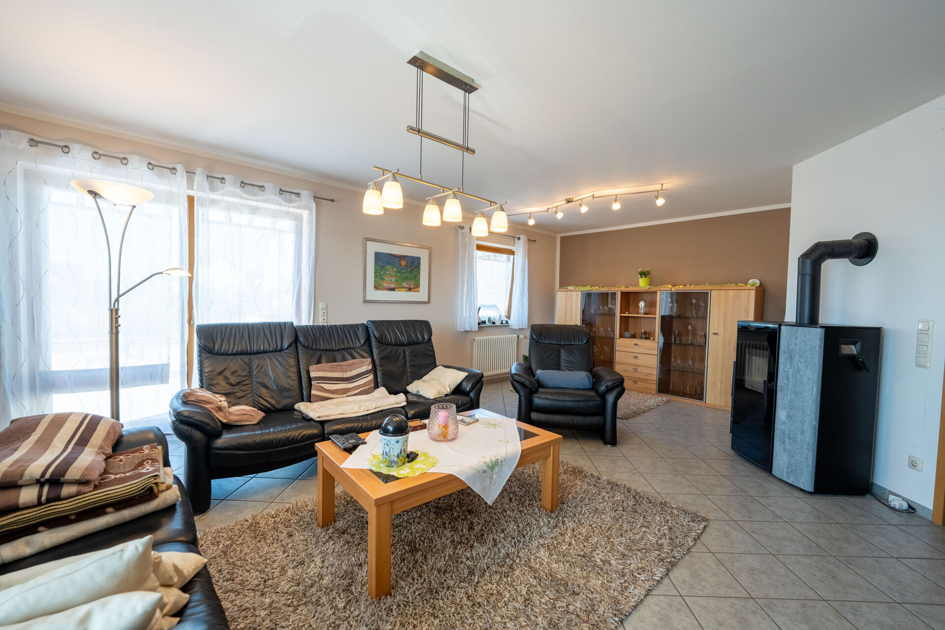 Wohnzimmer mit Kaminofen EG Whg. 1