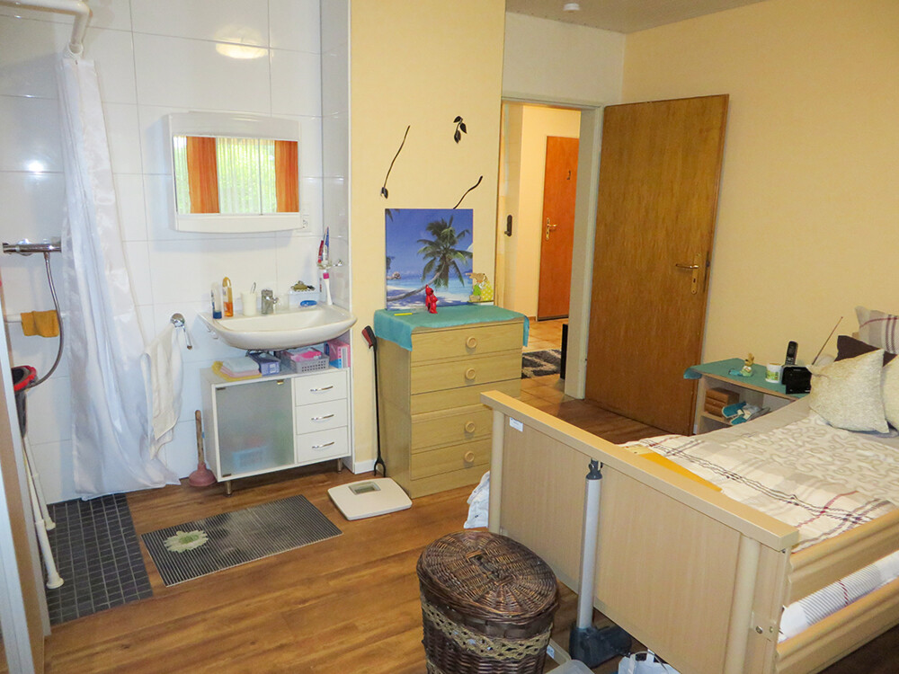 Schlafzimmer mit Dusche