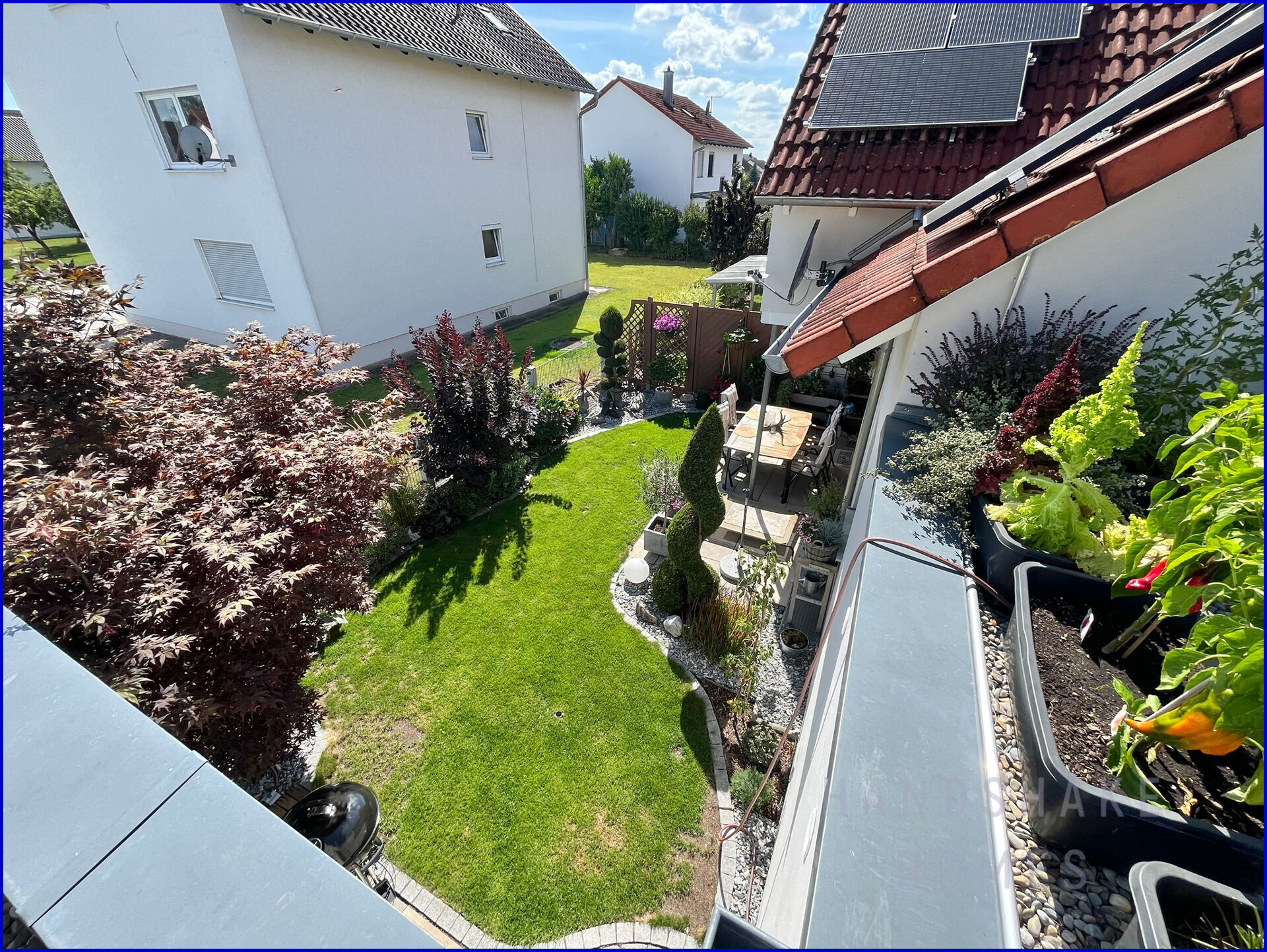 Gartenblick von Garagendach