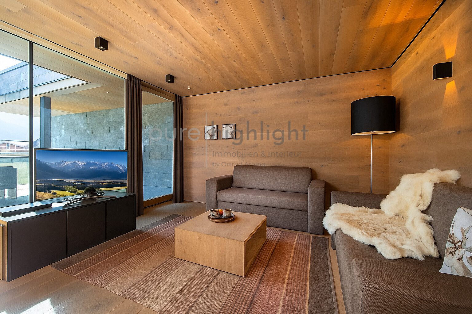 Moderne Bergwohnstube mit Panoramablick