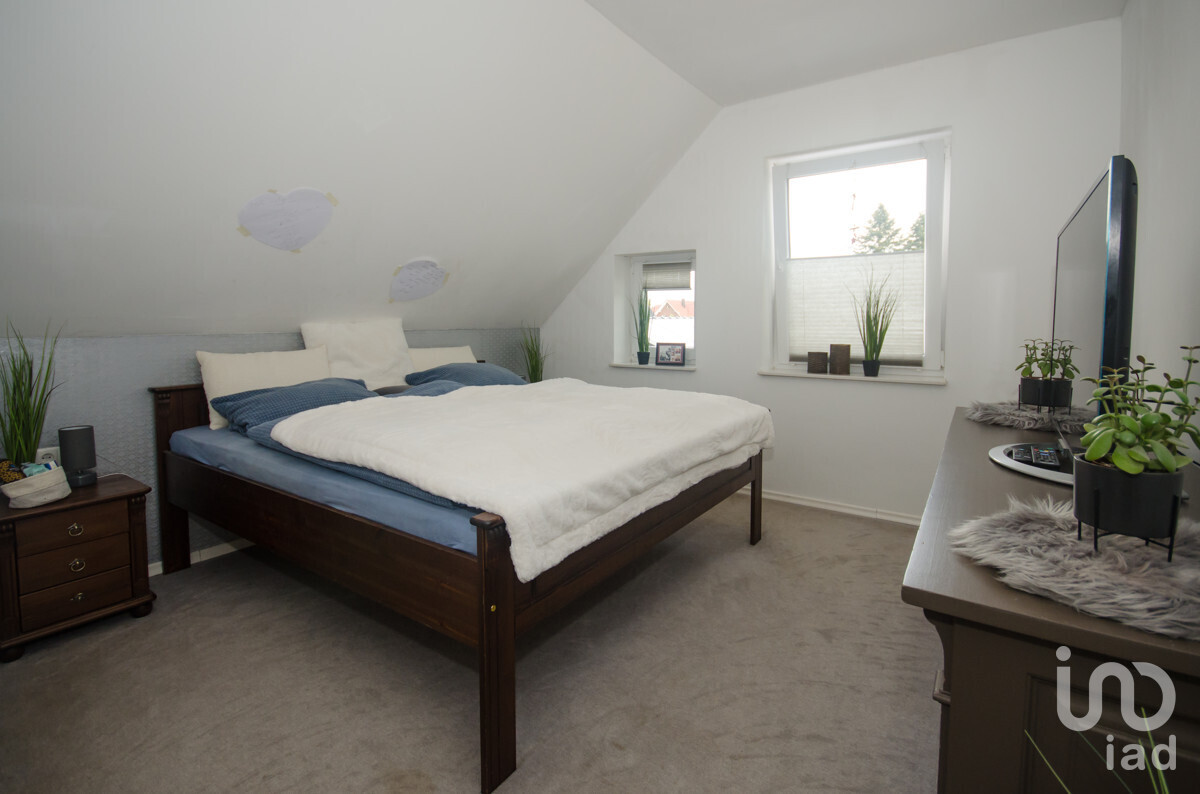 Elternschlafzimmer mit angrenzendem Ankleidebereich