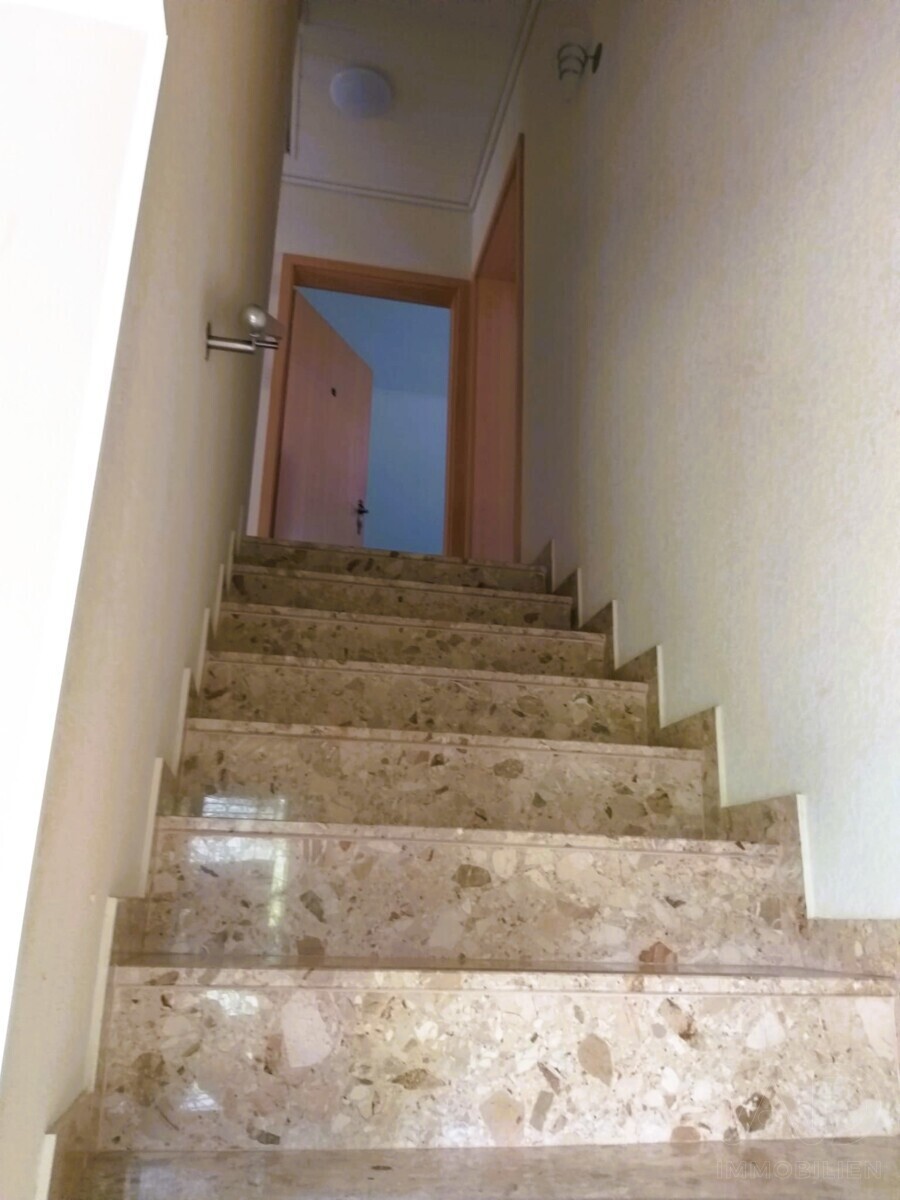 Treppenaufgang zur Dachgeschosswohnung
