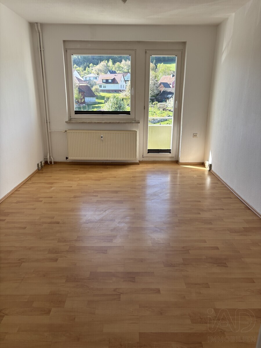 Wohnzimmer mit Balkon