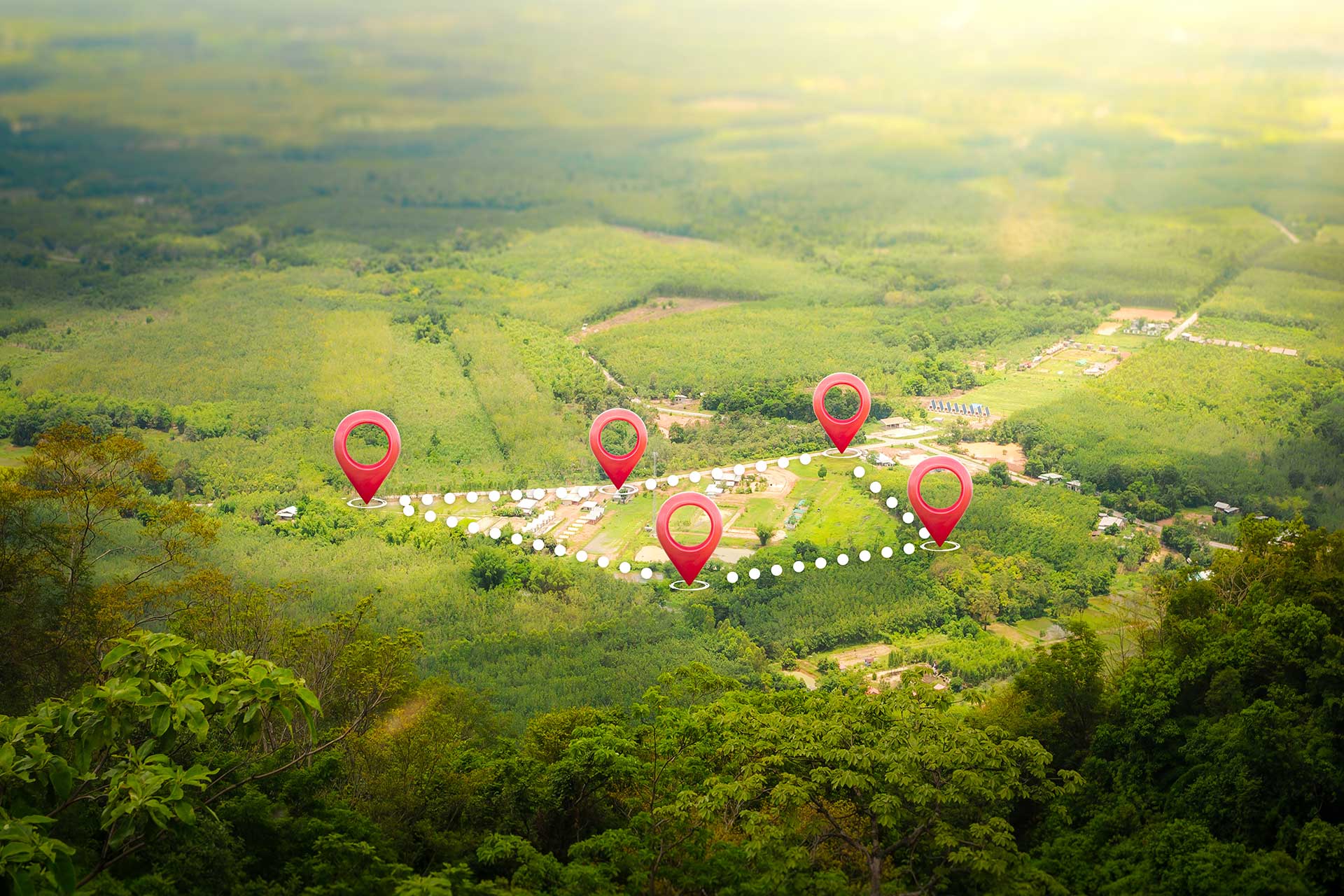 Luftansicht auf Wohngebiet mit markiertem Grundstück für den Bodenrichtwert