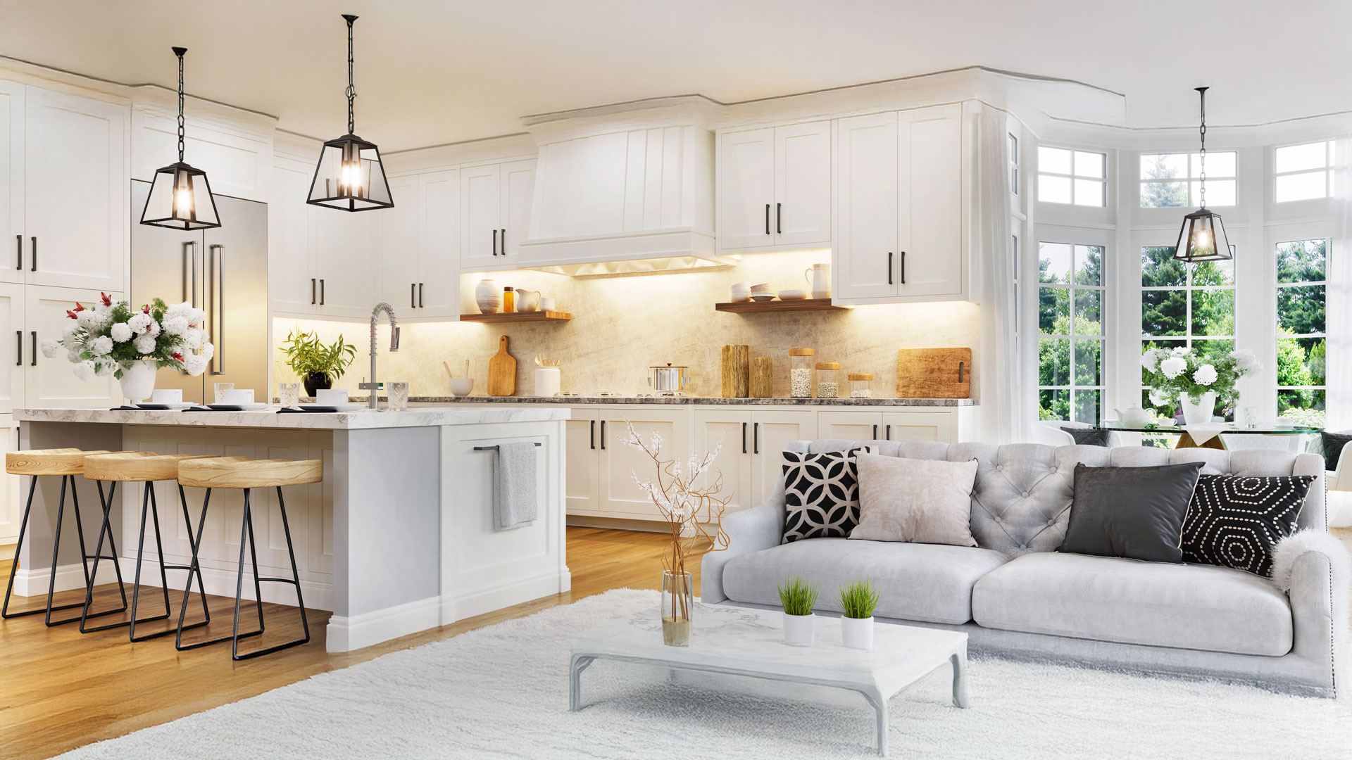 Weiße Wohnküche mit Insel, Sitzplätzen und großen Fenstern.