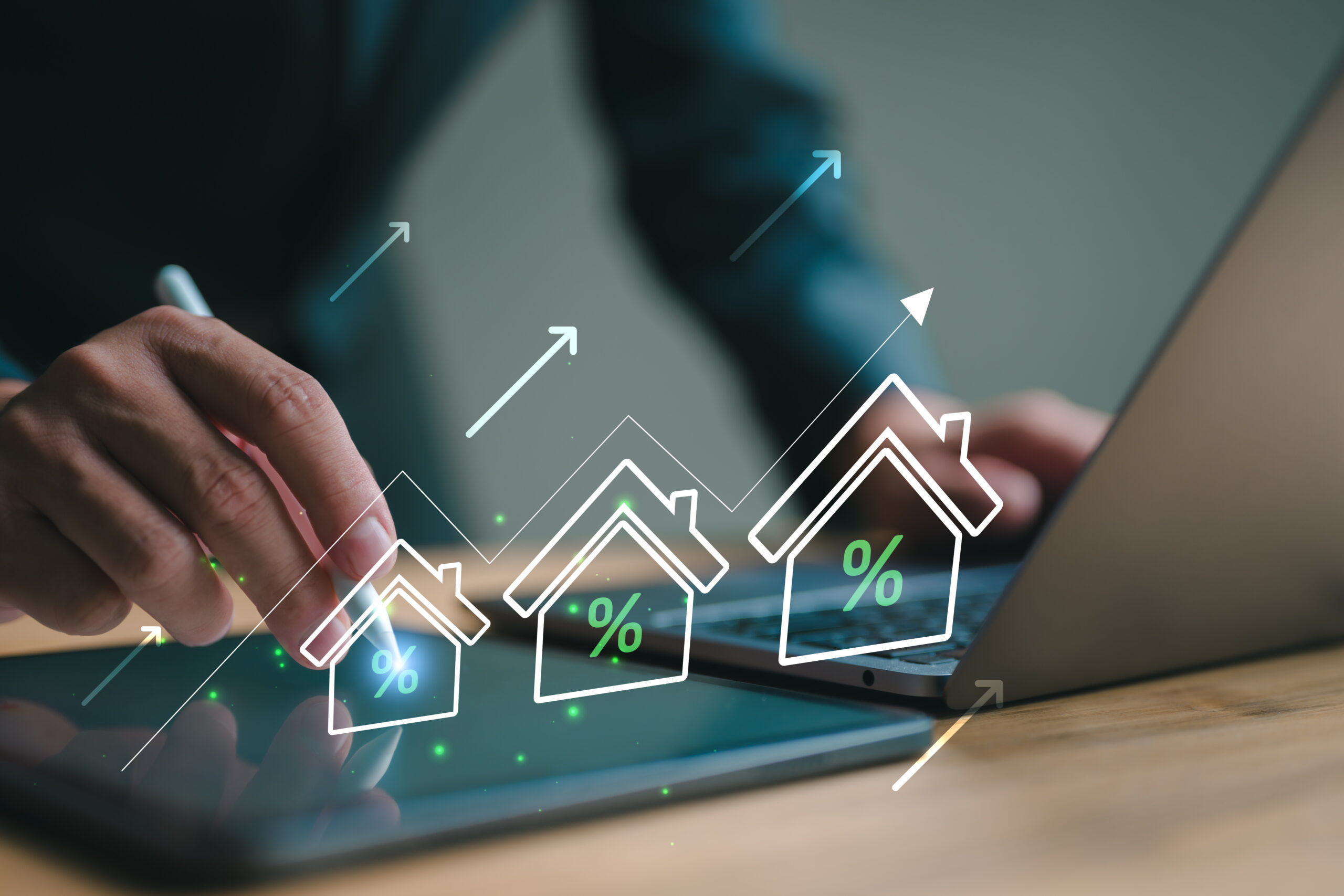 Laptop mit Modellhäusern