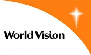 World Vision Logo: schwarze Schrift, weiß-orange, Stern rechts oben.